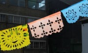 papel picado - mexican paper cut banners hanging in the sun