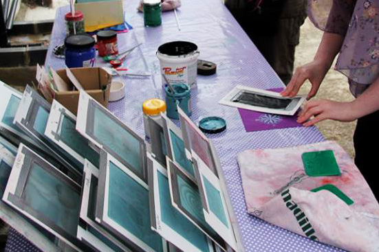 Selection of Gocco screens and one being printed