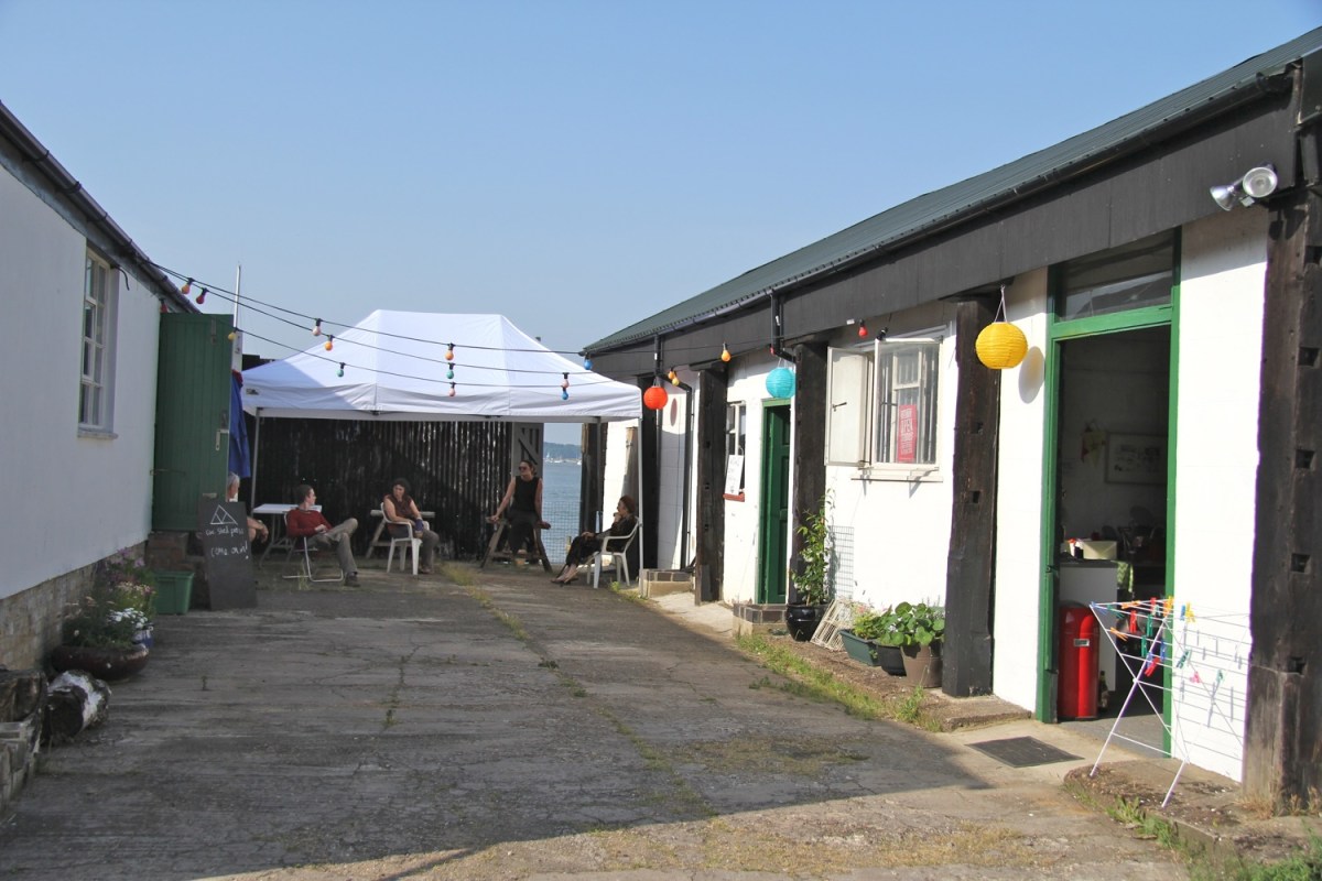 Studios and at Medway Fine Printmakers, with printmakers sitting under a gazebo in the yard