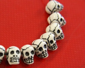 painted clay skull beads